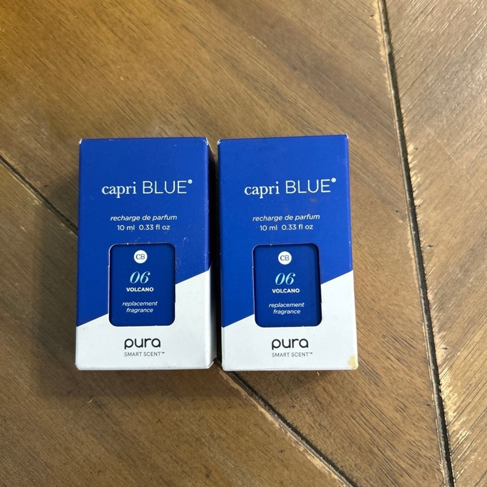 Two NEW Capri Blue Volcano Pura Inserts